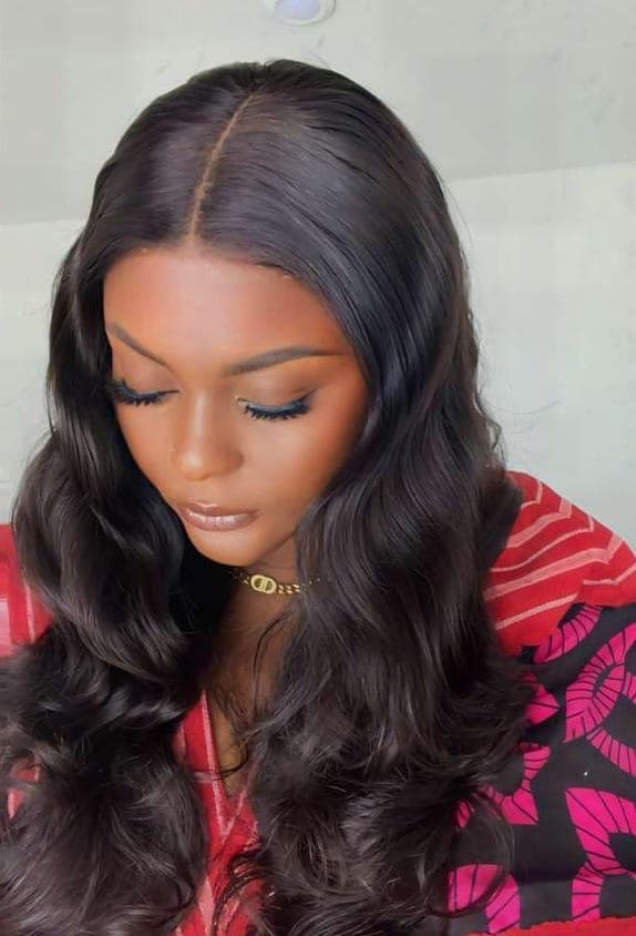 Loose body wave bundles styled in flowing layers
