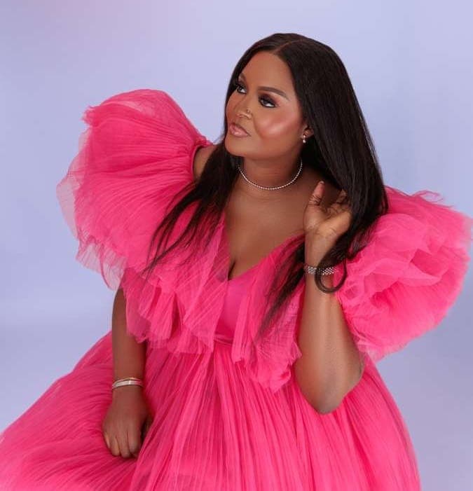 Model wearing a silky straight wig from the luxury collection